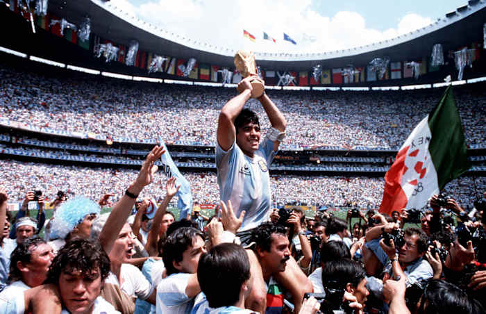 Diego Maradona lifts World Cup trophy